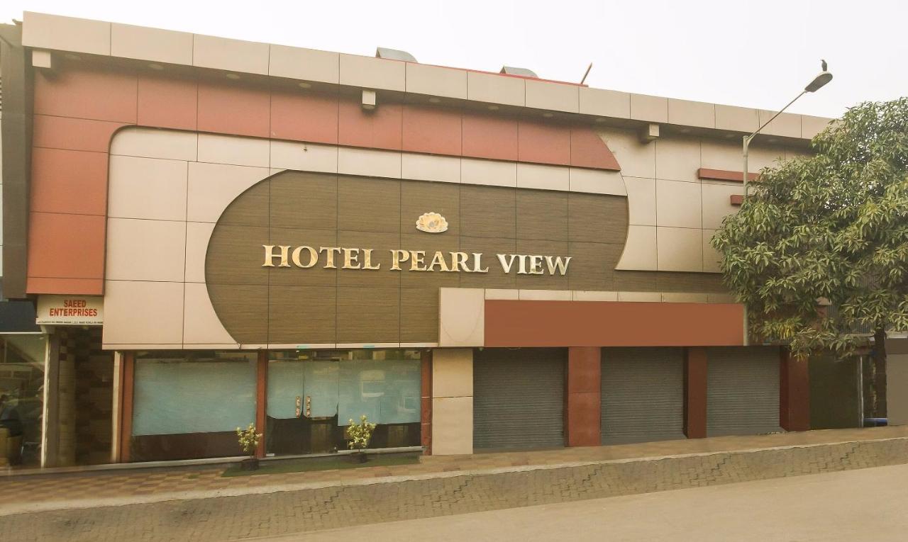 Capital O Hotel Pearl Near Us Embassy Мумбаи Экстерьер фото
